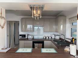 Contemporary Beachfront Bungalow With Direct Access to the Sea