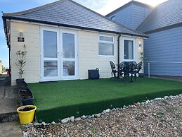 Contemporary Beachfront Bungalow With Direct Access to the Sea