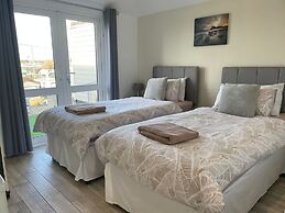 Contemporary Beachfront Bungalow With Direct Access to the Sea