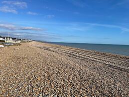 Contemporary Beachfront Bungalow With Direct Access to the Sea