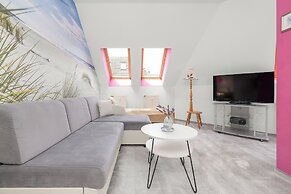 Kołobrzeg Centrum Pink by Renters