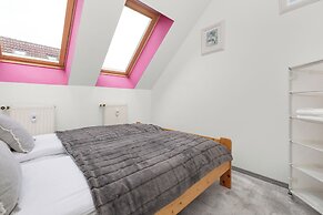 Kołobrzeg Centrum Pink by Renters