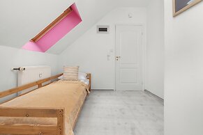 Kołobrzeg Centrum Pink by Renters