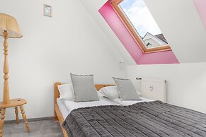 Kołobrzeg Centrum Pink by Renters