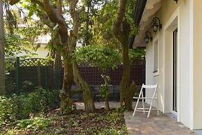 Willa Szwarc Cozy Garden Cottage