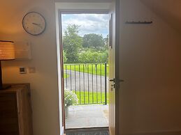 Cozy Studio Attic Retreat in Bettws Newydd