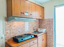 Warm And Modern Studio At Bassura City Apartment