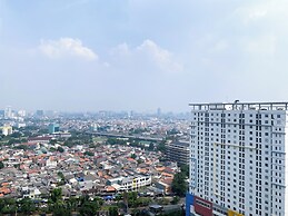 Warm And Modern Studio At Bassura City Apartment