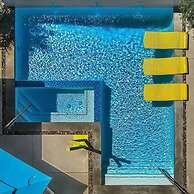 Four Palms in Deepwell Estates