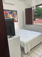 Quarto cama queen ar condicionado