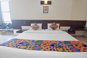 Fabhotel White Clouds