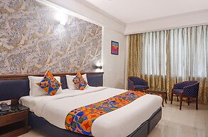 Fabhotel Prime Golden Emerald