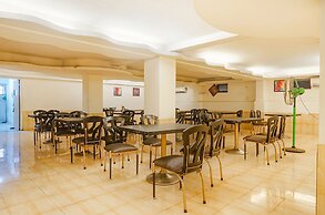 Fabhotel Prime Golden Emerald