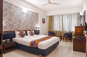 Fabhotel Prime Golden Emerald