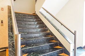 Fabhotel Prime Golden Emerald