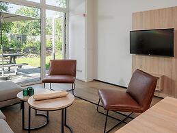 Nice Lodge With Dishwasher, in a Holiday Park in a Green Environment