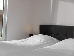 Modern Lodge With Dishwasher, on a Holiday Park in a Green Environment