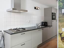 Modern Lodge With Dishwasher, on a Holiday Park in a Green Environment