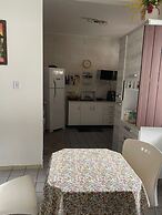 Quarto na praia com cama de casal