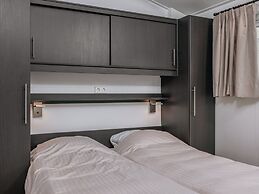 Composite Group Home With ac and Sloop, in a Holiday Park in Beautyful