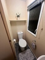 Lovely Caravan Located in an Amazing Holiday Park