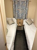 Lovely Caravan Located in an Amazing Holiday Park