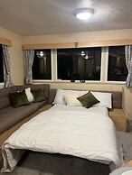 Lovely Caravan Located in an Amazing Holiday Park