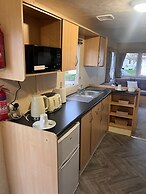 Lovely Caravan Located in an Amazing Holiday Park