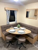 Lovely Caravan Located in an Amazing Holiday Park