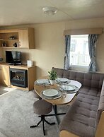 Lovely Caravan Located in an Amazing Holiday Park