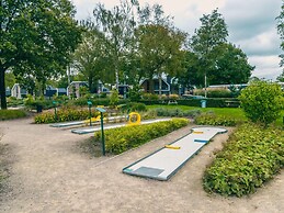 Chalet With Decorative Fireplace Near a Beach