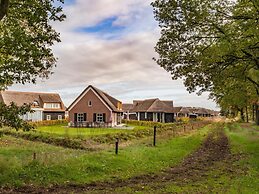 Thatched Villa With Sauna in Holiday Park