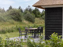 Thatched Villa With Sauna in Holiday Park
