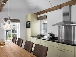 Thatched Villa With Sauna in Holiday Park