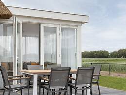 Thatched Villa With Sauna in Holiday Park