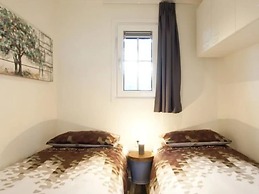 Nice Chalet in a Holiday Park