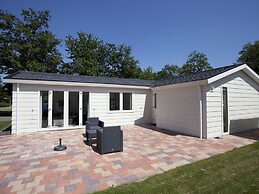 Nice Chalet Near the Golf Course in a Holiday Park