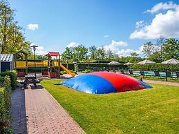 Nice Chalet Near the Golf Course in a Holiday Park