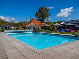 Nice Chalet Near the Golf Course in a Holiday Park