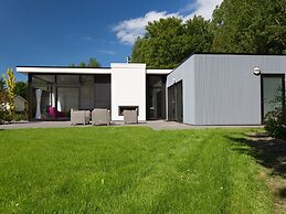 Modern Chalet With a Fireplace in a Holiday Park