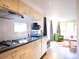 Well-kept Chalet in a Holiday Park, Adjacent to the Hoge Veluwe Nation