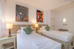 Amani Beachfront Villa by YourHost