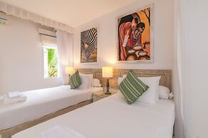 Amani Beachfront Villa by YourHost