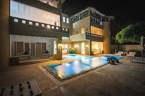 Amani Beachfront Villa by YourHost