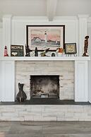 Coastal Charm: Seaside Hideaway 3 Bedroom Home by RedAwning