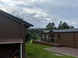 Rustic Lodge Retreat at Riverview Holiday Park