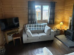 Rustic Lodge Retreat at Riverview Holiday Park