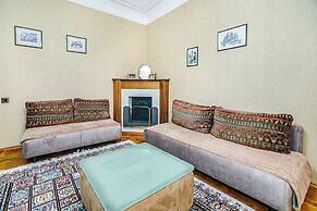 Luxury Apartment with Flame Tower View