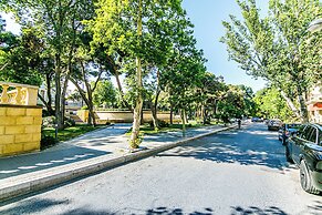 Luxury Apartment with Flame Tower View