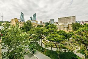 Luxury Apartment with Flame Tower View